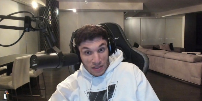 Trainwreckstv speaking on stream at his setup